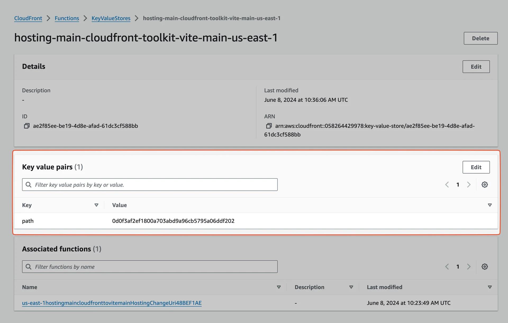 Screenshot of an AWS CloudFront Key-Value Store details page. The page shows the store name "hosting-main-cloudfront-toolkit-vite-main-us-east-1" with its ID, last modified date, and ARN. Below, there is a section for key-value pairs with one entry: Key "path" and Value "0d0f3af2ef1800a703abd9a96cb5795a06ddf202". There is also a section for associated functions, listing one function named "us-east-1hostingmaincloudfrontvitemainHostingChangeUri48BEF1AE".