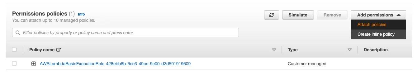 Selecting "attach policy" via the AWS Console. Selecting "attach policy" via the AWS Console.